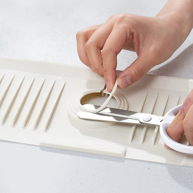 Tapis de protection en silicone pour robinet de lavabo